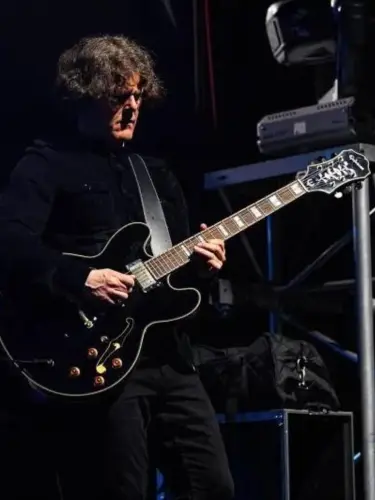 Bryan Dignan Guitar Teacher Playing Guitar at gig Dressed In Black